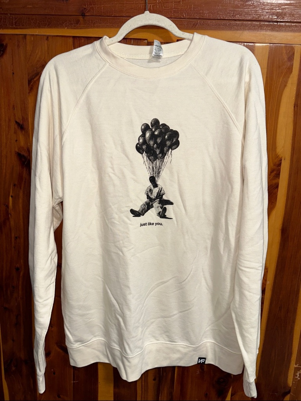 NF Just Like You Cream Crewneck with Black Balloon Illustration